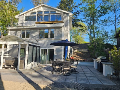 Fire up the grill, soak in the hot tub, then up to the upper deck sunset  views!