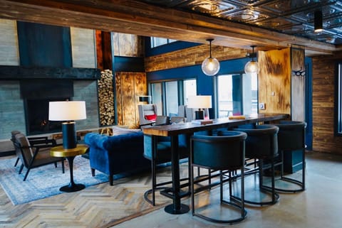 Thoughtfully designed gathering space with modern furnishings and natural textures, creating a serene and welcoming retreat.
