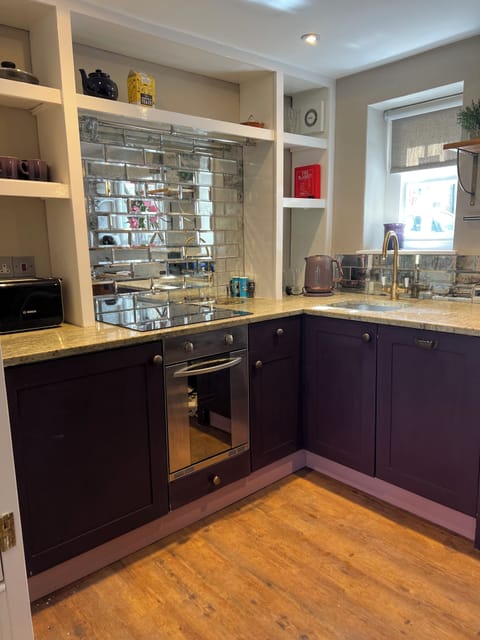 Kitchen area inc dishwasher microwave, fridge,oven/hob & coffee machine