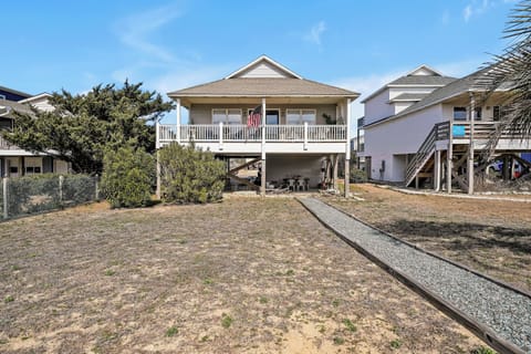 Welcome to Practically Perfect at 2505 W Dolphin Drive on Oak Island, NC! 