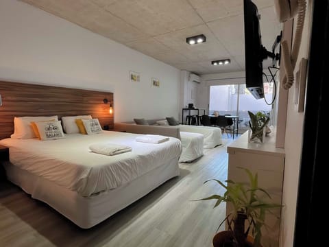 Classic Apartment, Multiple Beds, Balcony, City View | 1 bedroom, desk, laptop workspace, iron/ironing board