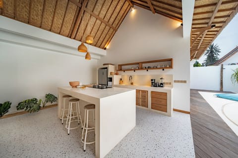Villa | Private kitchen | Full-size fridge, toaster, cookware/dishes/utensils