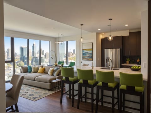 Deluxe Suite, 1 Bedroom | Living area | 50-inch Smart TV with digital channels, Netflix, streaming services