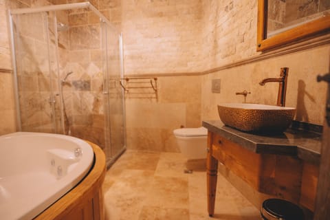 Suite | Bathroom | Hair dryer, slippers, towels, soap