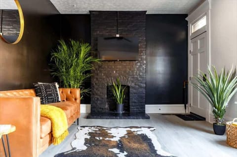 Our living room is a blend of modern aesthetics and cozy vibes with ample seating and stylish accents—your perfect spot for downtime in your Airbnb! Kick back and relax 