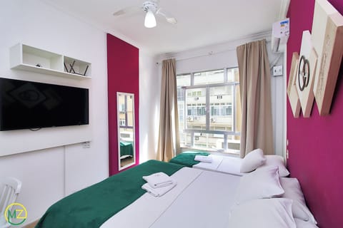 Economy Studio, Partial Ocean View | Blackout drapes, iron/ironing board, free WiFi