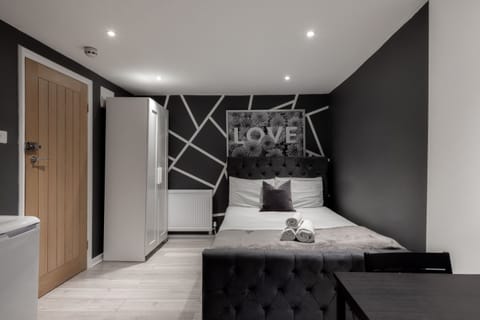 Apartment, Private Bathroom | Desk, laptop workspace, iron/ironing board