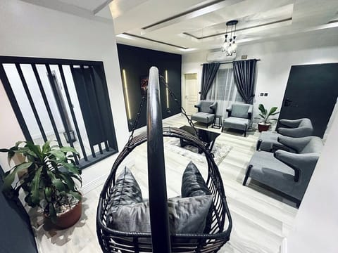 Family Apartment, Balcony, City View | Living area | Flat-screen TV