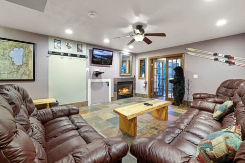 Spacious living area with fireplace and Smart TV