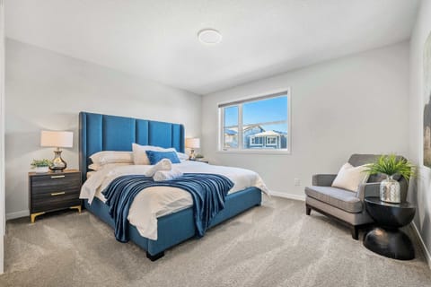 Room to breathe, room to rest - king bed, sitting area, and everything you need for a proper night in.