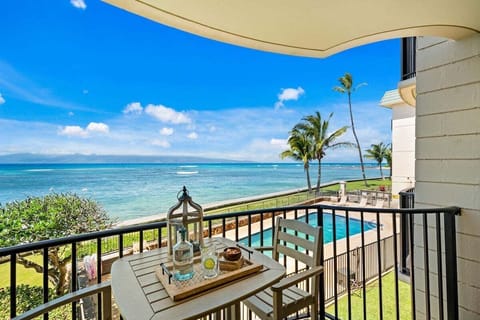 Enjoy alfresco dining with breathtaking views of the turquoise waters right from your balcony