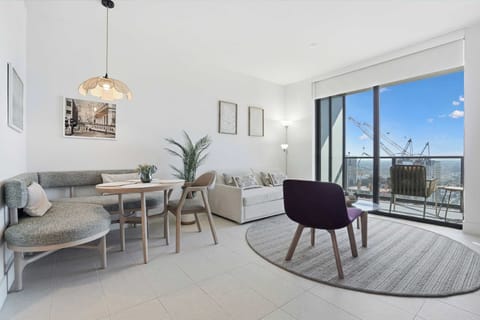 Relax in this stylish living area with city views!