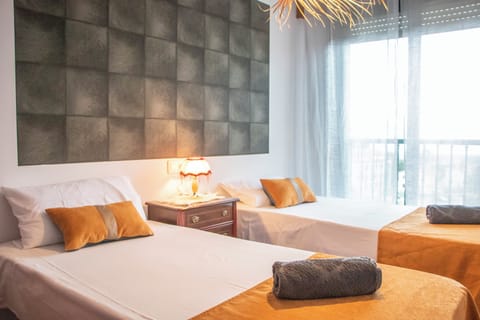 Apartment, 4 Bedrooms | Desk, laptop workspace, iron/ironing board, free WiFi