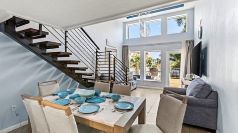 Kitchen conveniently next to dining table.