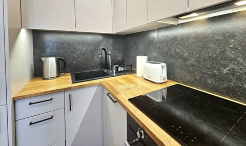 Comfort Apartment, Balcony, Beach View | Private kitchen | Fridge, stovetop, dishwasher, coffee/tea maker