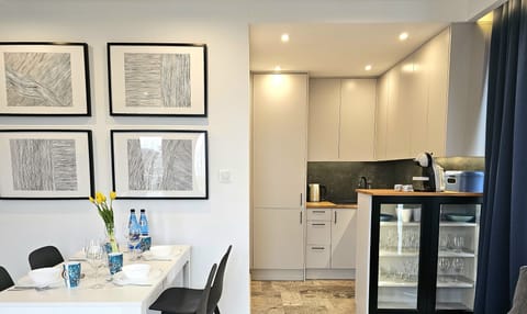 Comfort Apartment, Balcony, Beach View | Living area | 50-inch LCD TV with cable channels