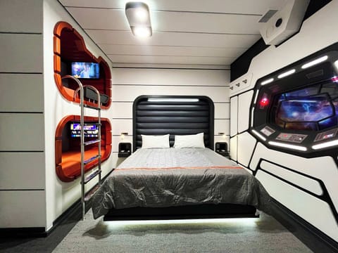 Sleep inside of the Millennium Falcon!! HUGE room upstairs with 2 built in custom bunk beds + queen bed! Perfect fun room for families with small children, or for teen and younger kids to lodge together!