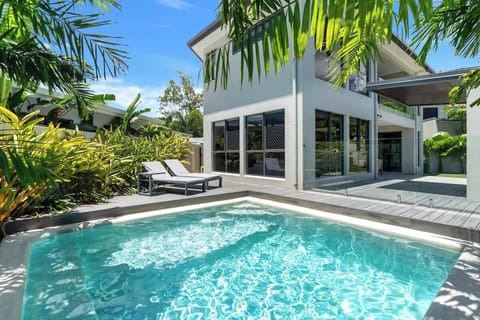 Bask by the sparkling private pool, where sun loungers and tropical breezes create the perfect setting for relaxation.