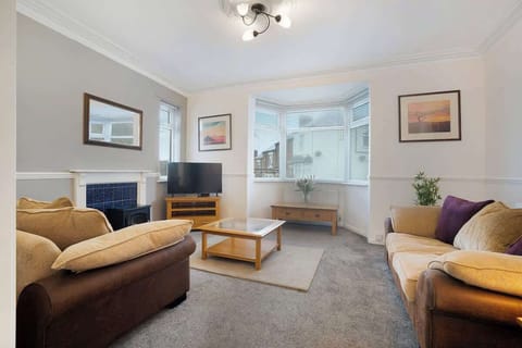 Unwind in our open-plan living and dining area, complete with a Smart TV and a plush sofa for ultimate comfort.