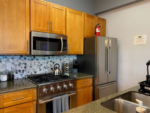 Gourmet Kitchen with range, fridge, dishwasher - everything needed to cook