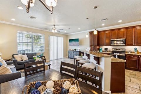 Cook, dine, and relax in this roomy open-plan layout that keeps everyone connected and comfy.