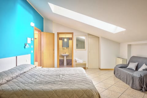 Triple Room | Desk, laptop workspace, blackout drapes, free WiFi