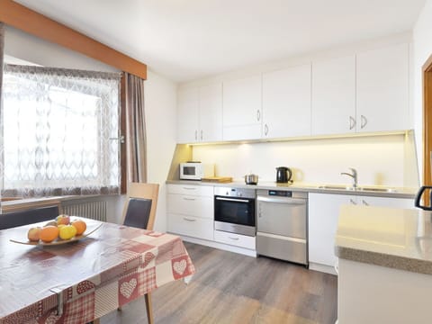 Interior Design, Furniture, Flooring, Kitchen, Wood, Floor, Ceiling, Countertop, Room, Cabinetry