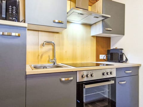 Kitchen Appliance, Kitchen, Countertop, Major Appliance, Cabinetry, Home Appliance, Kitchen Sink, Kitchen Stove, Plumbing Fixture, Interior Design