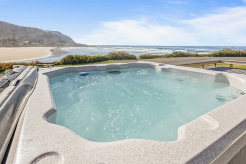 Watch the night stars or the ocean tides from the ocean front hot tub.