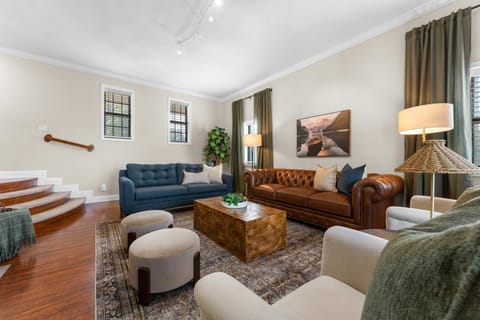 Curl up in the chic living room & enjoy a movie night at home