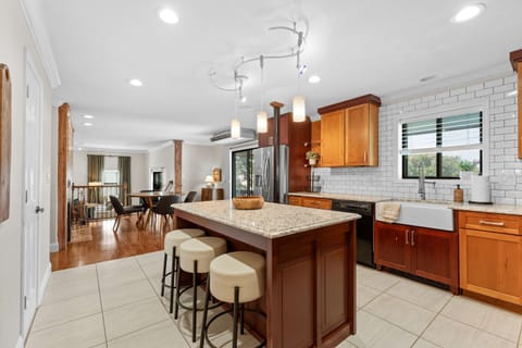 The warm, open kitchen offers ample space & every home comfort