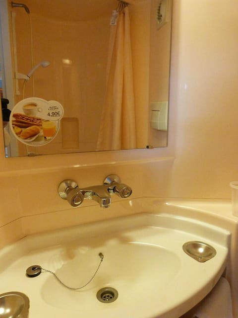 Shower, free toiletries, towels, soap