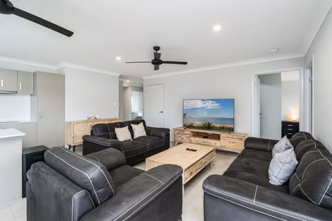 Enjoy open-plan living with modern furnishings