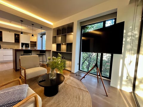 Apartment | Living area | 46-inch flat-screen TV with digital channels