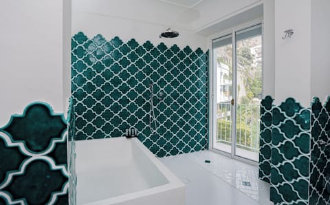 Suite, Sea View | Bathroom | Eco-friendly toiletries, hair dryer, bathrobes, slippers