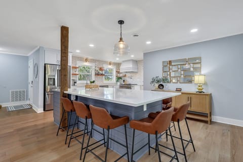 Open kitchen with large Island with seating for 8