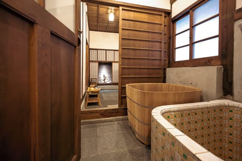 Director's home | Bathroom | Bathtub, hair dryer, towels, soap