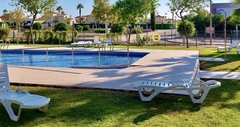 Enjoy a large communal swimming pool surrounded by landscaped gardens, perfect for relaxing in the sun or taking a refreshing dip in a peaceful and natural environment.