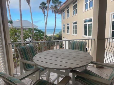 Large balcony with views, seating and fan