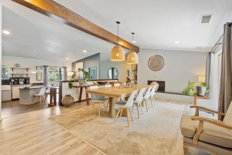 Gather in a bright and airy kitchen-dining space, perfect for shared meals and quality time with loved ones.