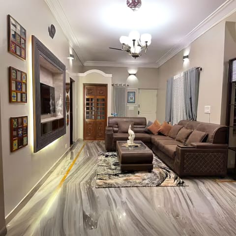 Luxury Apartment | Living area | Flat-screen TV