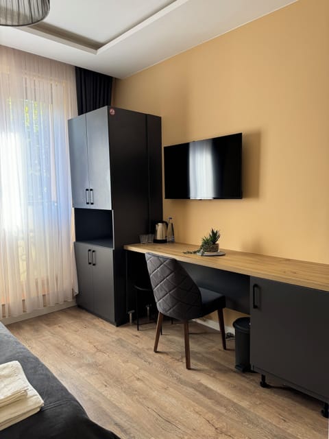 Deluxe Double Room, 1 King Bed, Garden View | Desk, laptop workspace, free WiFi, bed sheets