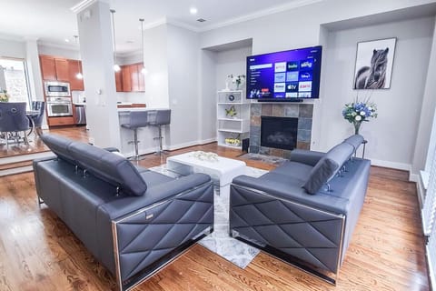 Modern yet luxury style living room with huge windows accompanied by a spacious balcony!
