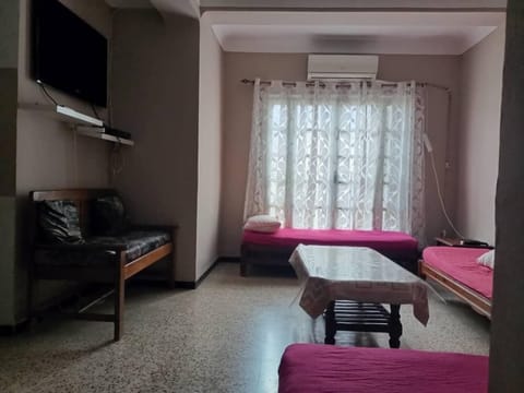 Basic Apartment | Living area | Flat-screen TV