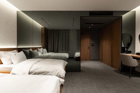 Luxury Triple Room, City View | In-room safe, blackout drapes, soundproofing, iron/ironing board