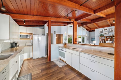 Full kitchen open to dining and living area