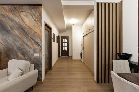 Comfort Apartment | Living area | Flat-screen TV