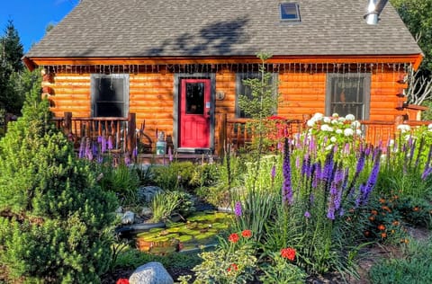 Built in traditional log style with modern touches, Bear Cabin features two main-level bedrooms and a spacious loft, sleeping up to nine. Enjoy AC, a hot tub, fire pit, and more for a cozy and comfortable stay.