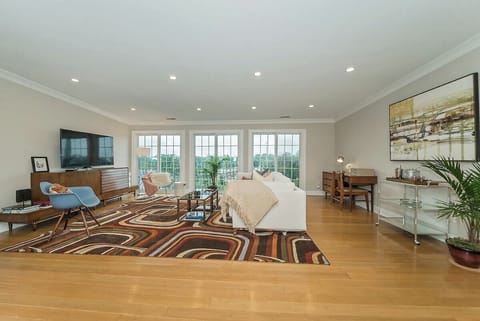 Stunning Living Space with Floor-to-ceiling Glass Doors