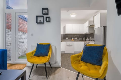 A charming living and kitchen area where every moment feels comfortable and effortless 🛋️🍷🍽️